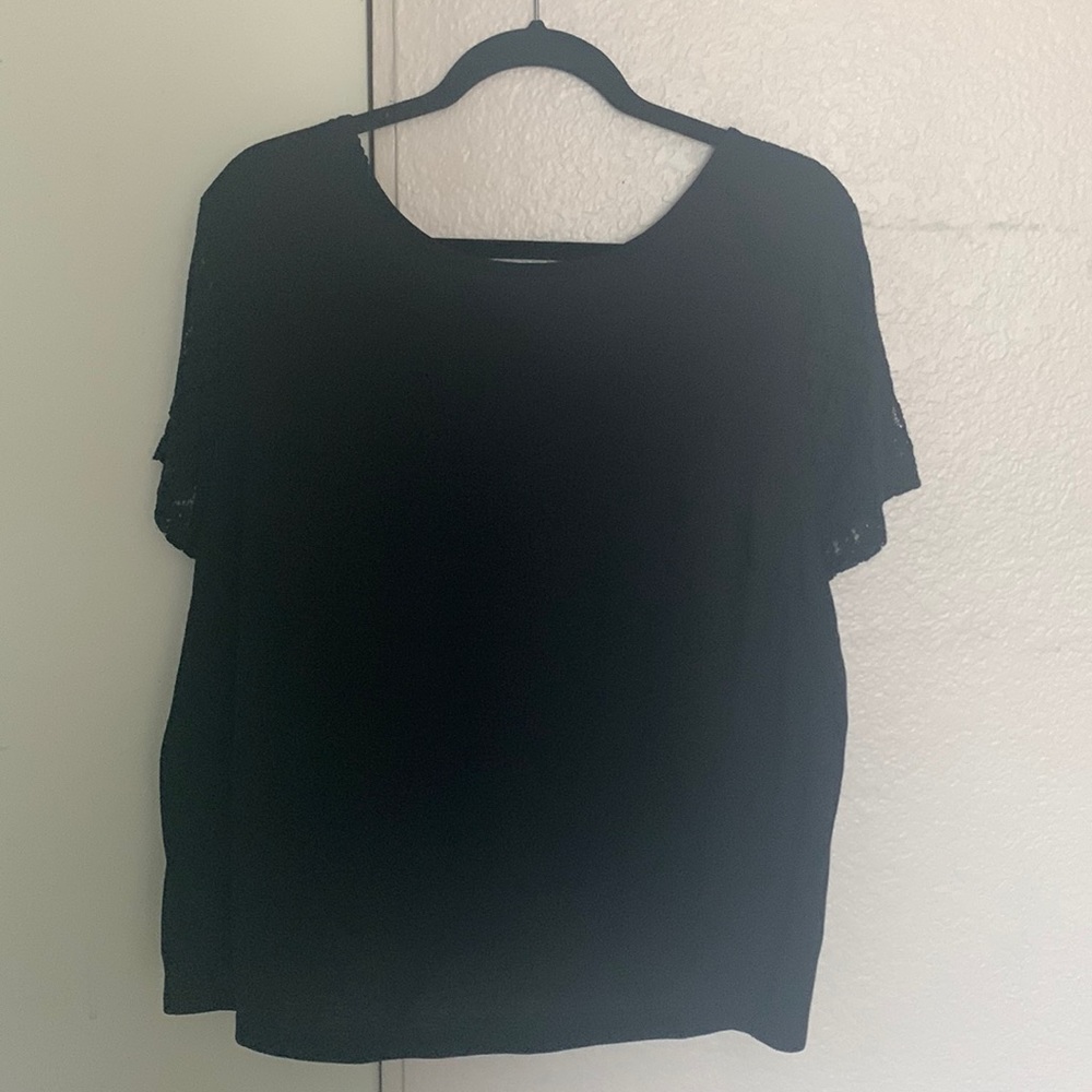 Women’s black top with lace back. Size XL